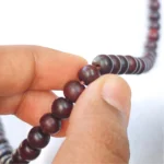 red sandalwood mala - closeup shot