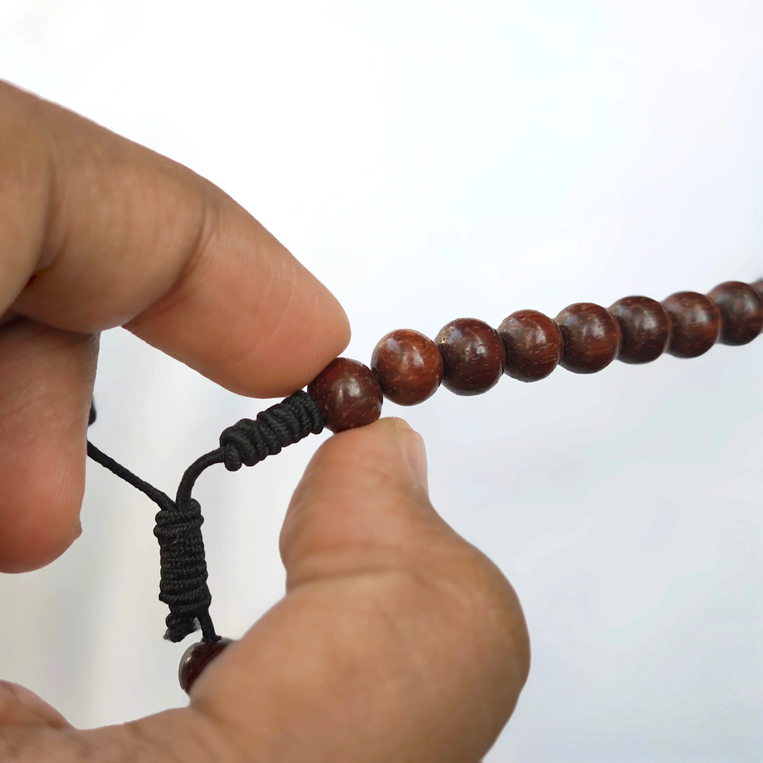 red-sandalwood-christian-rosary-wooden-beads-cross-closeup